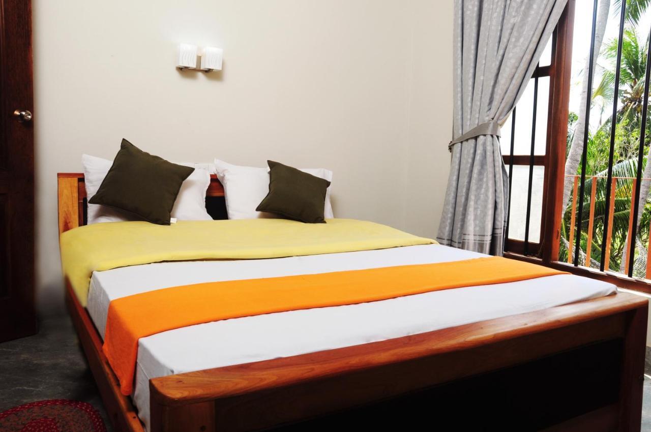 Traveller'S Home Hotel تيساماهاراما الغرفة الصورة