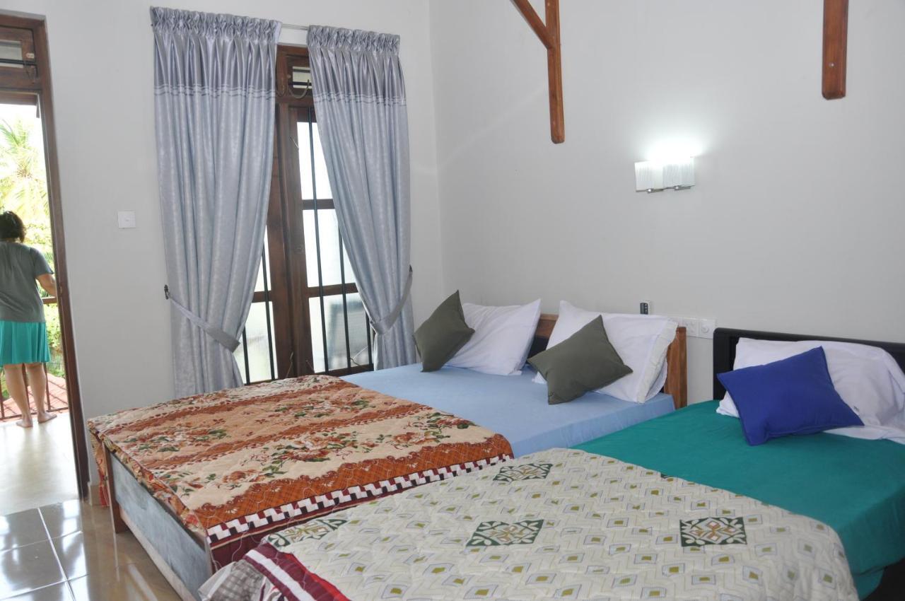 Traveller'S Home Hotel تيساماهاراما الغرفة الصورة
